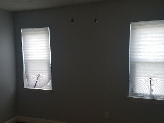 carpet in bedrooms with ceiling fans