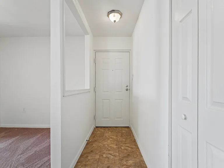 2BR, 1.5BA - 939SF - Vacant - Foyer, Coat Closet and Living Room