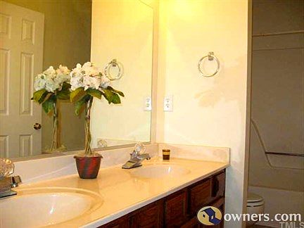 Full bath with double sink.