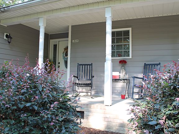 Front porch runs the 2/3 of the house, and offers abundant a