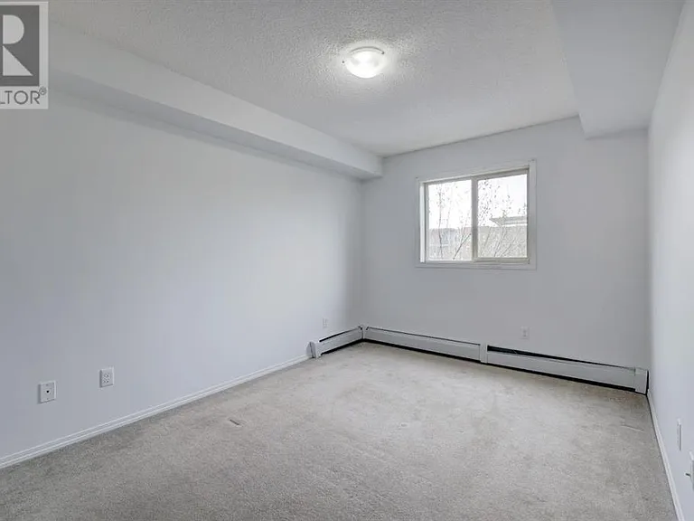 403 Mackenzie Way SW #7210 — Photo 16