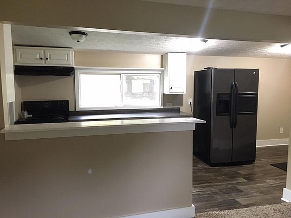 Kitchen with bar & high end appliances