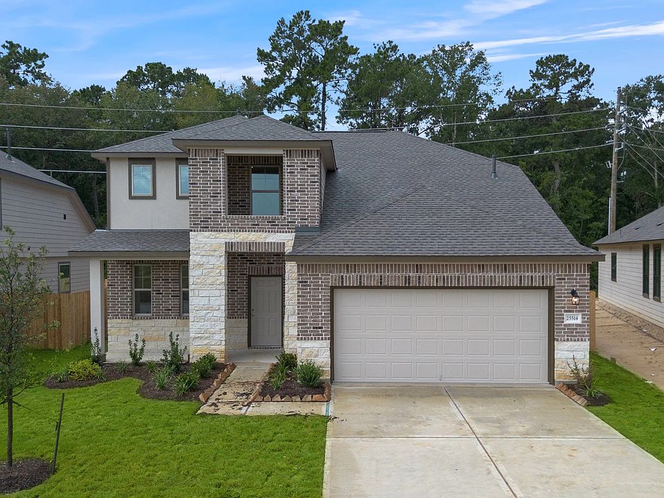 Welcome home to 25514 West Blackwater Creek Trail located in the community of Spring Creek Trails an