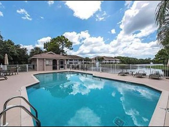 Heated Community Pool with Cabana and Full Outdoor Kitchen w Grill