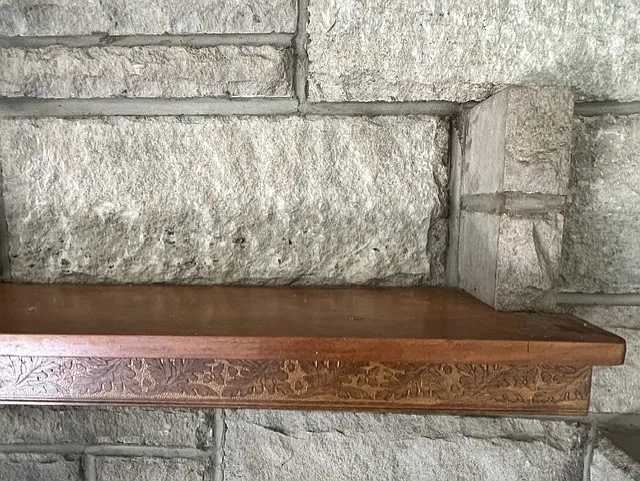 Fireplace carving detail.