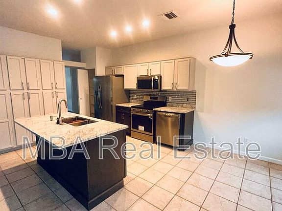 4th image of 5563 E Greasewood St