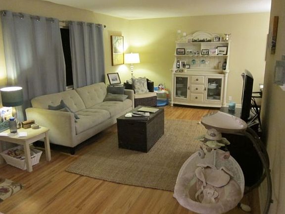 main floor living room with large picture window