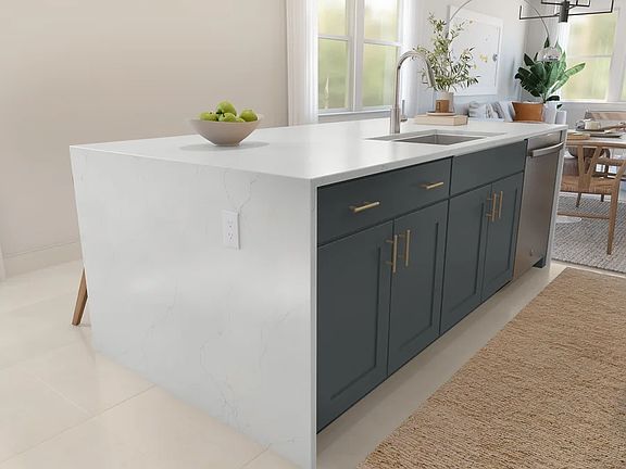 Kitchen with waterfall island and stainless steel undermount sink