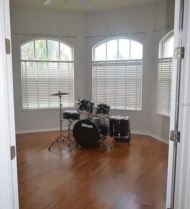 Den - currently being used as a music room - notice the oak flooring