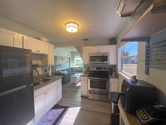 Kitchen with stainless steel appliances