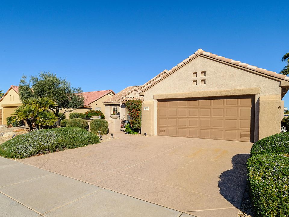 Front of house. Beautiful landscaping