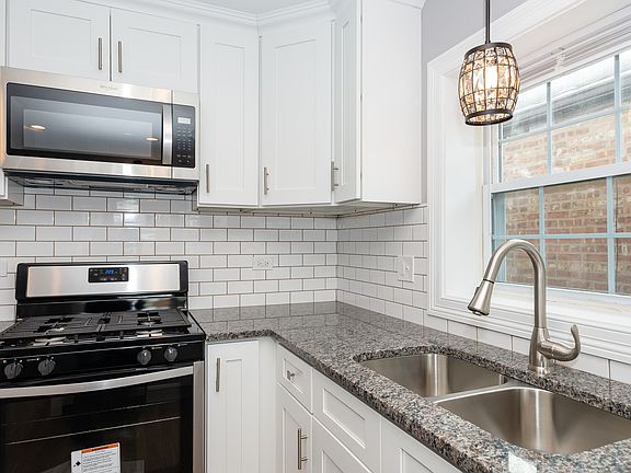5th image of 8942 S Essex Ave