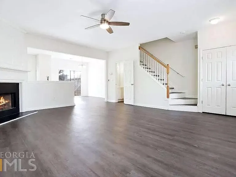 Living Room with Coat Closet in Entrance