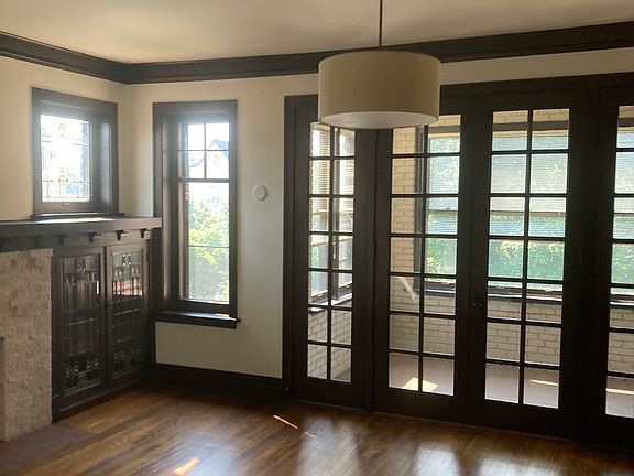 Living room with French doors leading to solarium