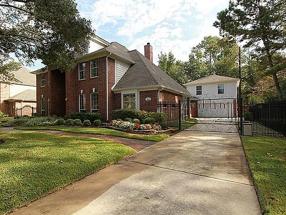 2 Car Detached Garage with a remote control drive way gate and --yes--a TX basement over the Garage!
