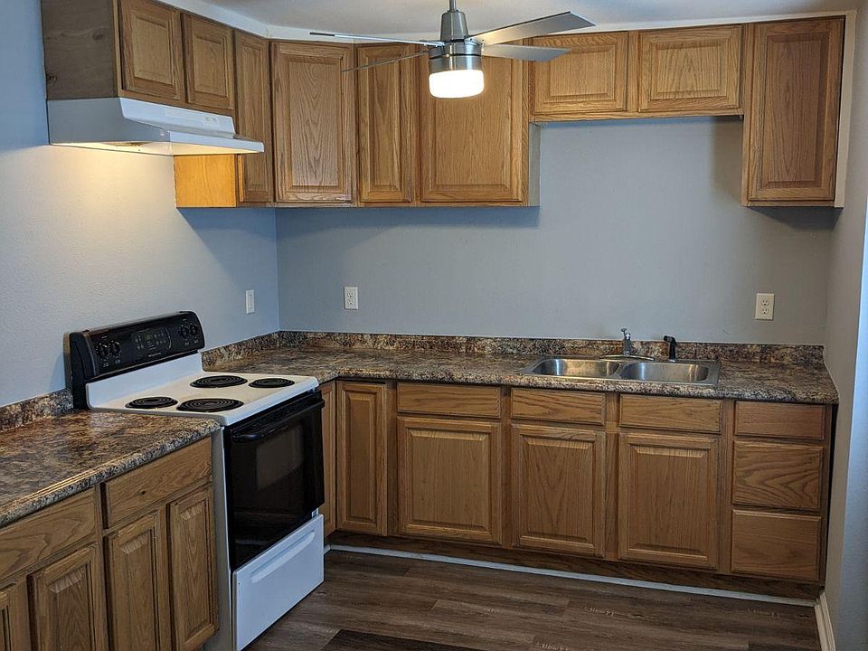 Kitchen with back door to private outdoor deck
