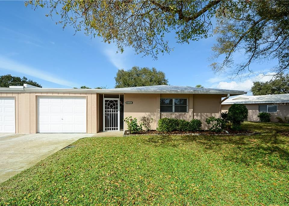 1st image of 3116 Village Green Dr #1122