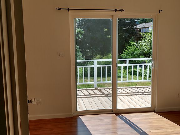 Downstairs bedroom/office to back deck, notice original glass doorknob!
