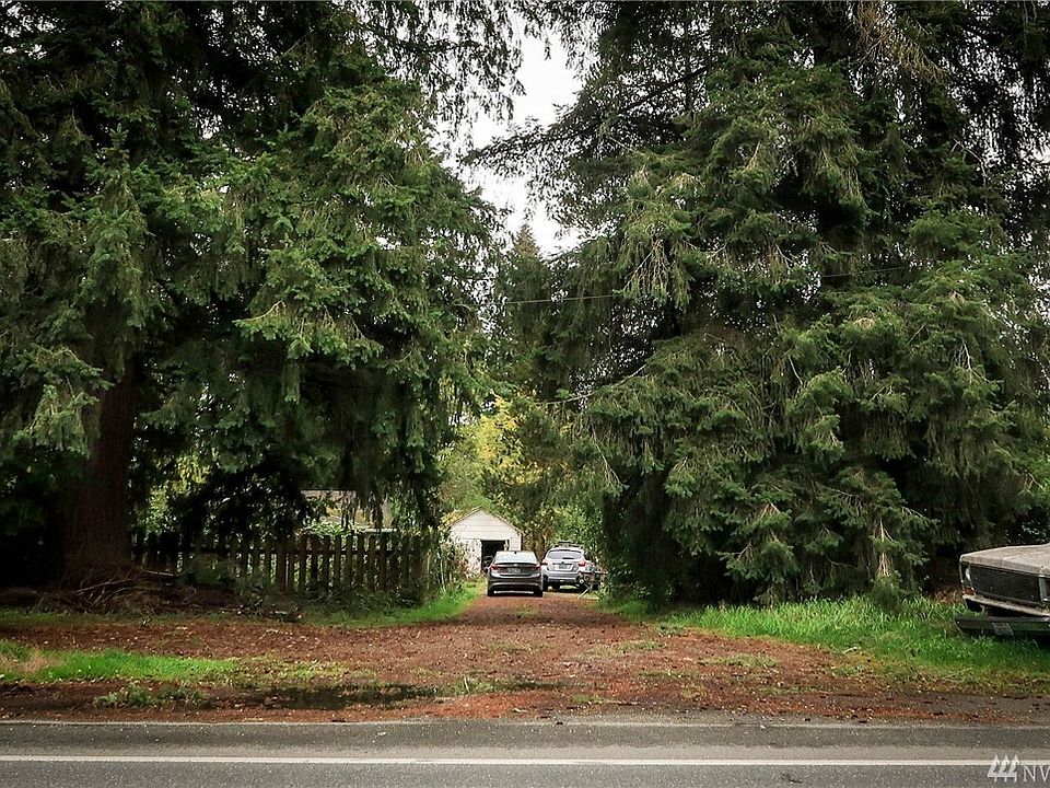 View of the driveway and house from main road HWY 202