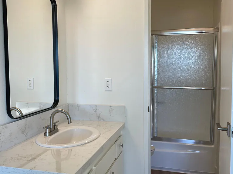 Flat level master bath, external sink area with new fixtures and granite counters.
--
Washing machine connection, approximate width of area in split level apartments.
--
*Floor plans are digital renderings. All dimensions are approximate. Actual product a