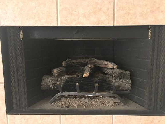 Ceramic logs in fireplace