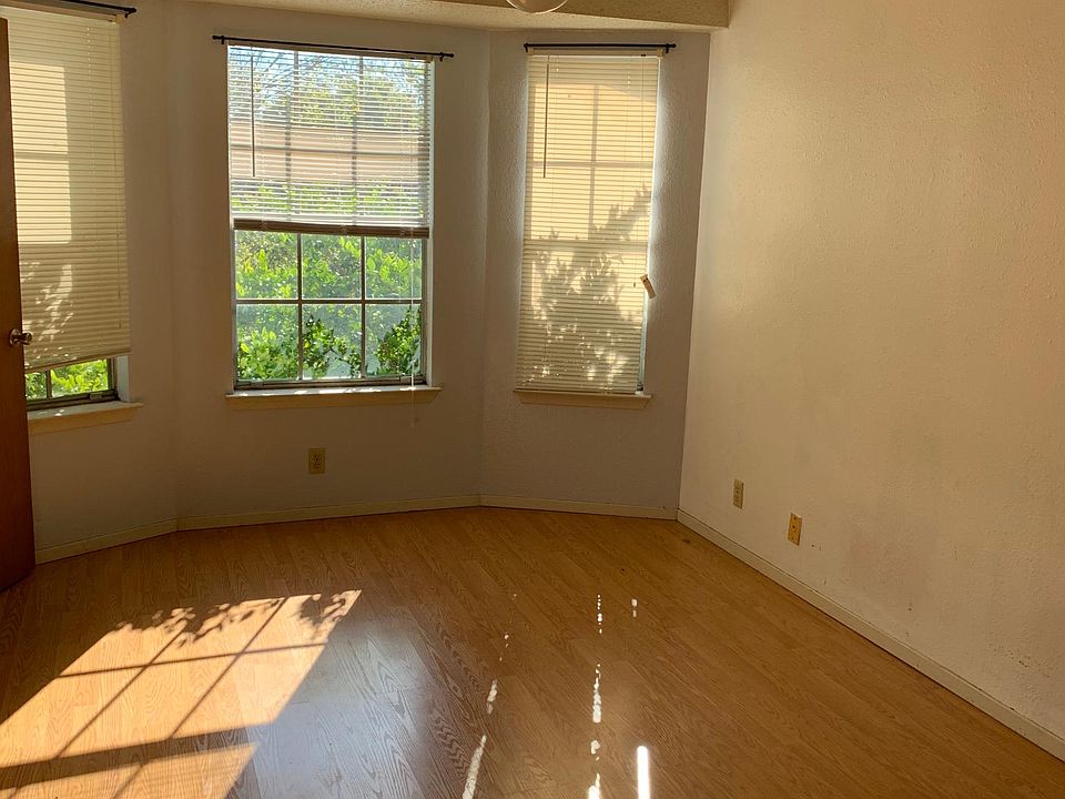 Bedroom one with bay windows, private full bath and walk ini closet.