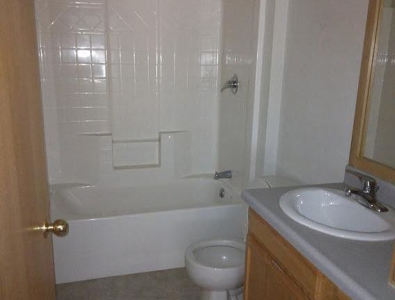 2nd bathroom, off of family room and next to 2nd and 3rd bedrooms.