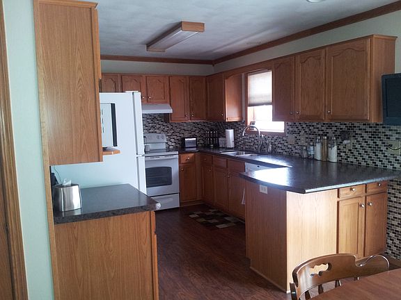 Completely updated kitchen, new floors, tile back splash, appliances, counters