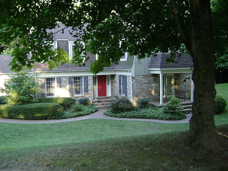 4.5 acres on quiet street, beautiful setting