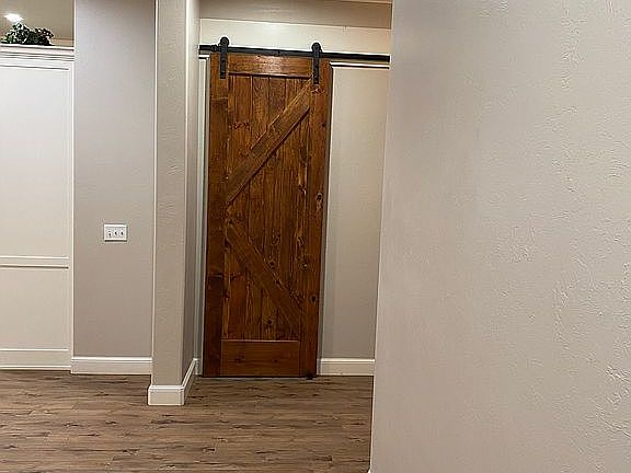 Barn Door leads to utility 