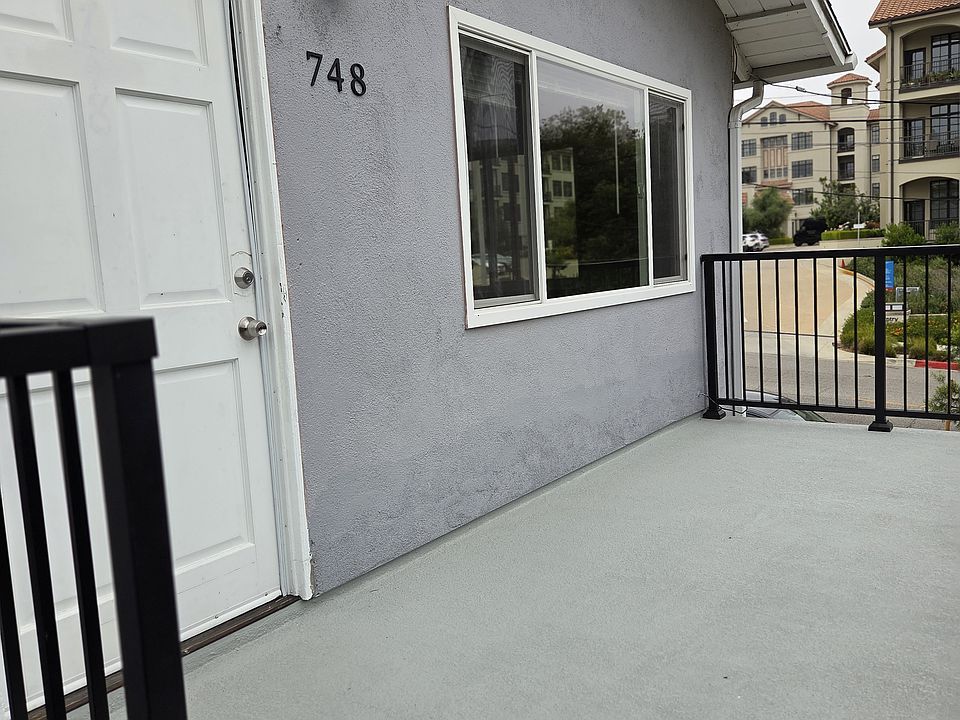 Front of unit and balcony