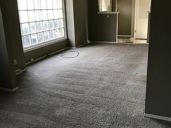 View from formal dining room looking towards front door entr