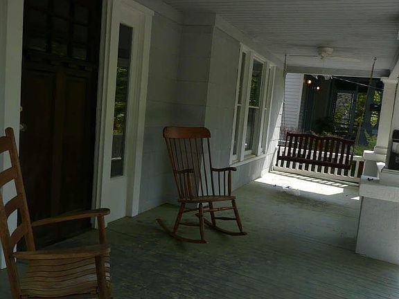 Charming front porch with views of Atlanta skyline