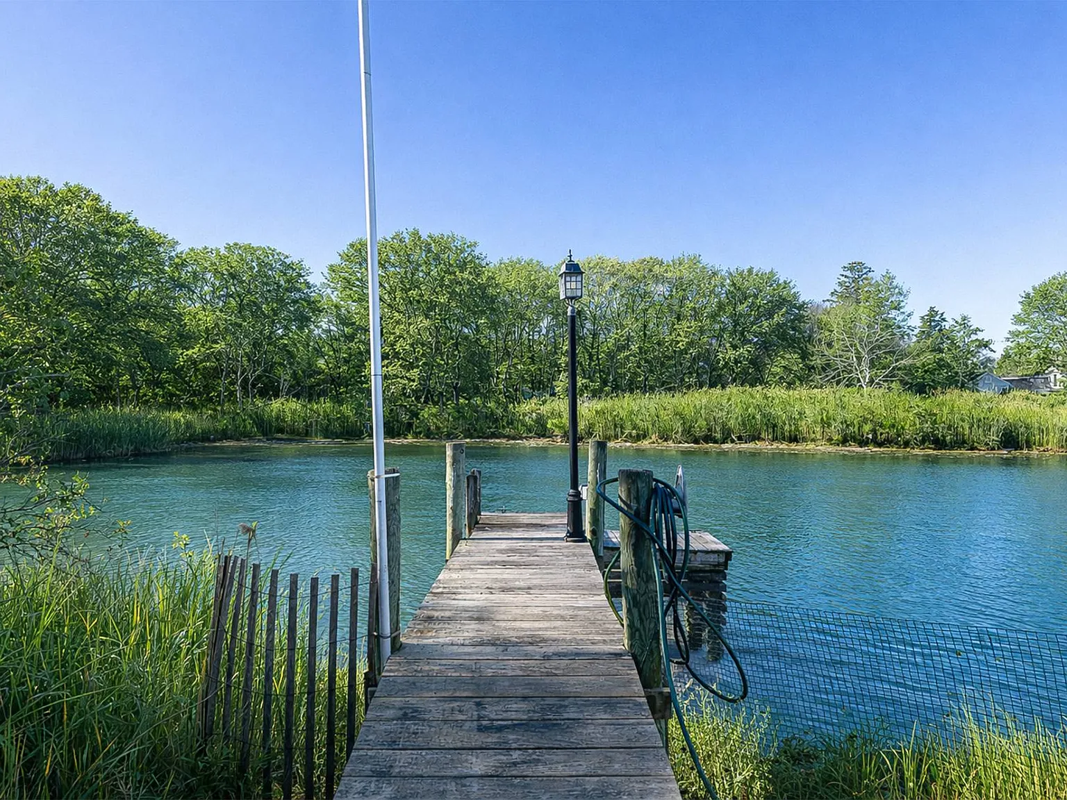 Waterfront Retreat with Dock & Pool on Noyac Harbor — Photo 2