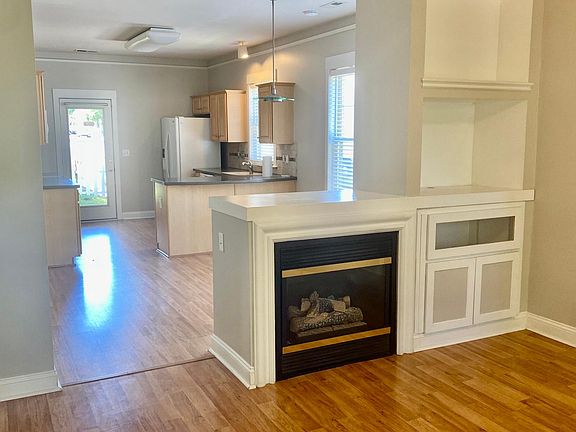 Family room with Kitchen in the background