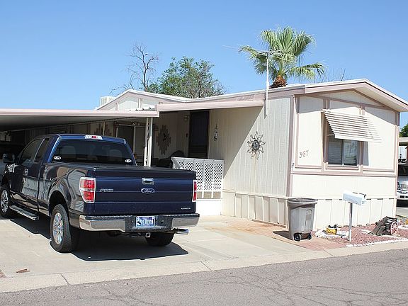 View from NW: carport, porch