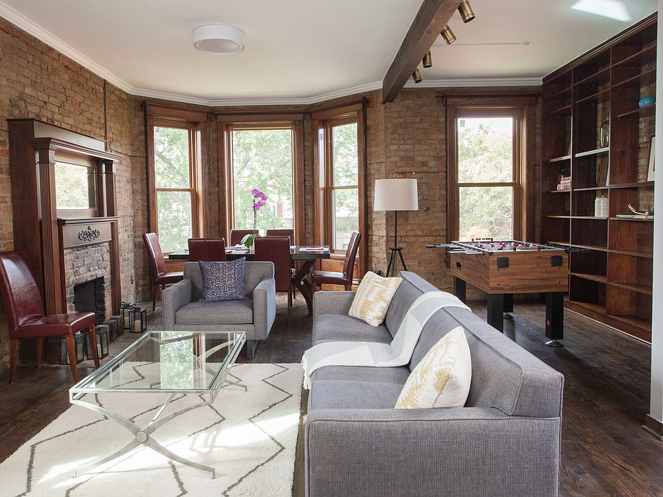 Huge windows + wide open floor plan. Dining , living and kitchen all together in one amazing space.