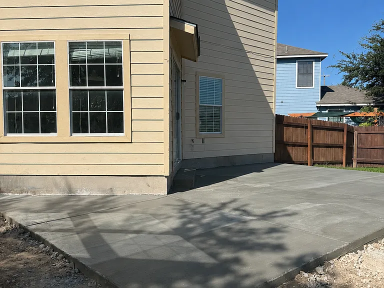 Backyard, new concrete slab.