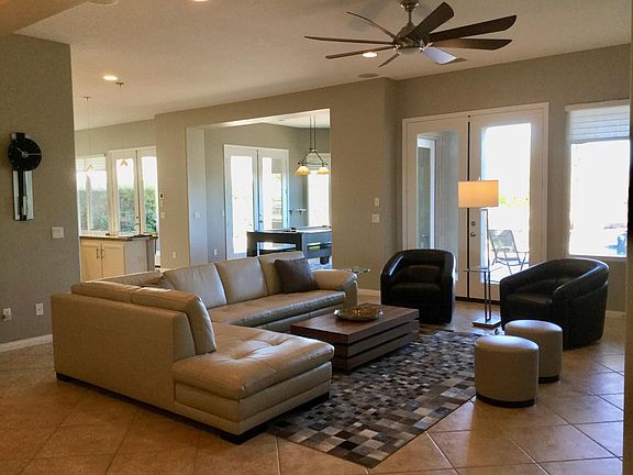 Great Room w/ 70_ ceiling fan, fireplace, seating for up to 10