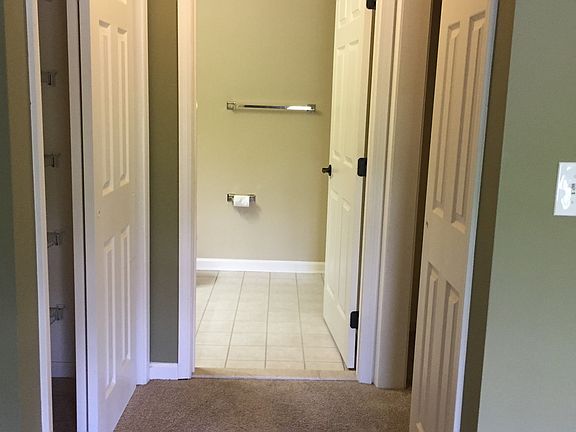 His and her closets in Master