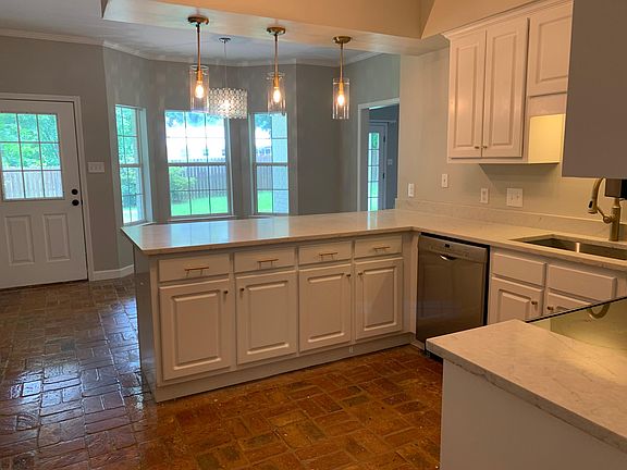 Kitchen looking towards back yard and breakfast nook area