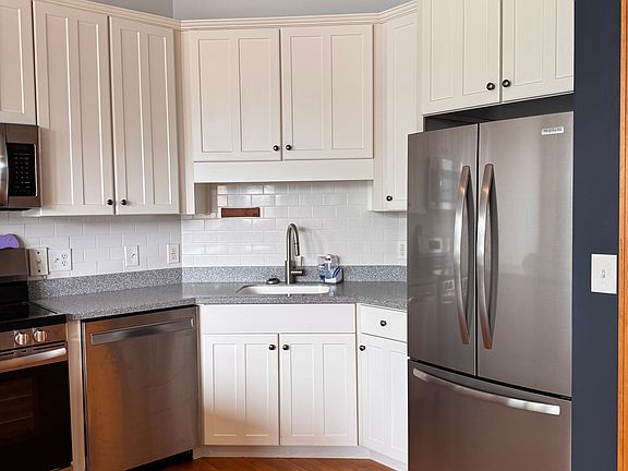 Less than 2 year old appliances. Glass top range, microwave over and french door refrigerator with slide out freezer.