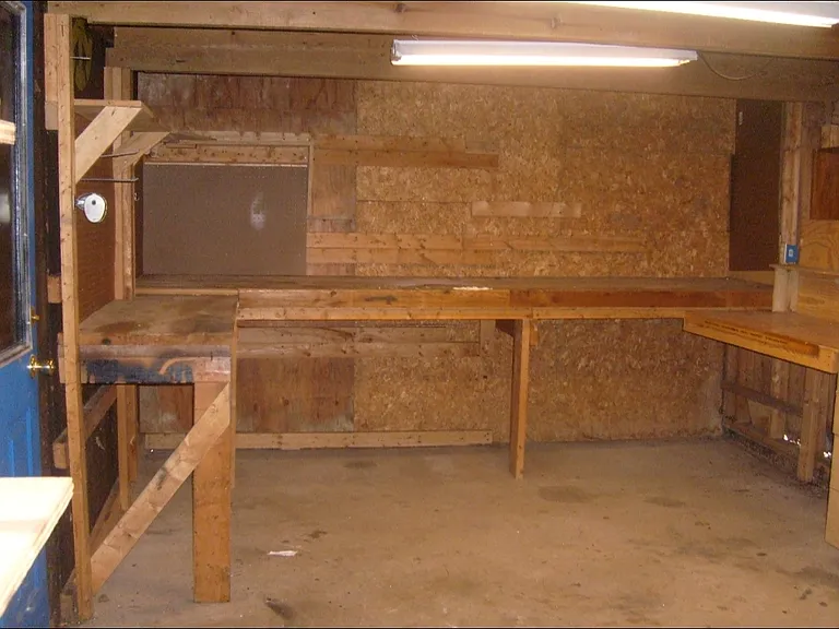 Work shed connected to a two car detached garage.