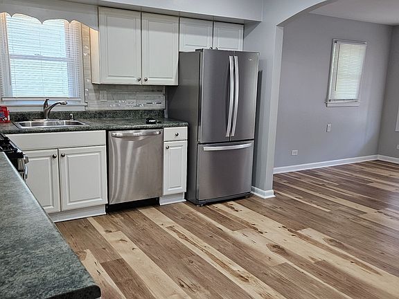 kitchen opens to living room