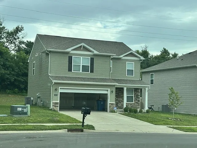 Home, with 2-stall attached garage