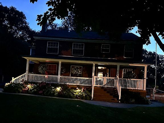 Gated porch front and side