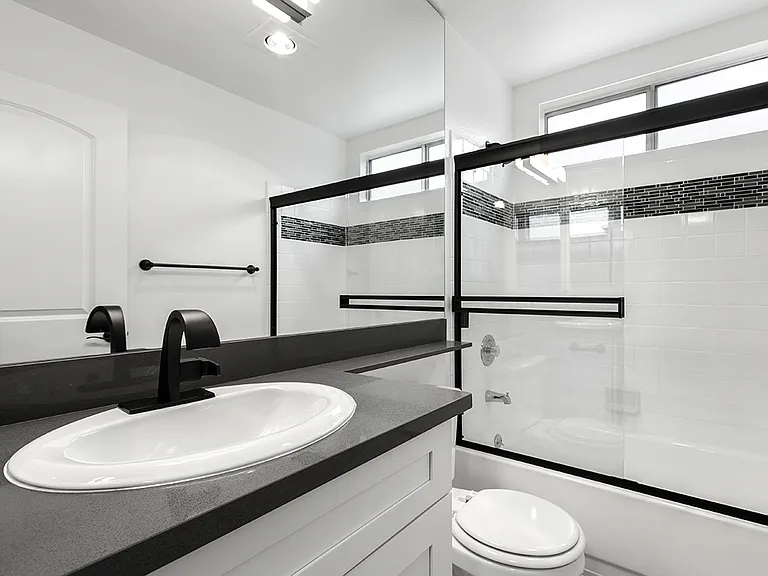 Modern styled bathroom with shower and tub.