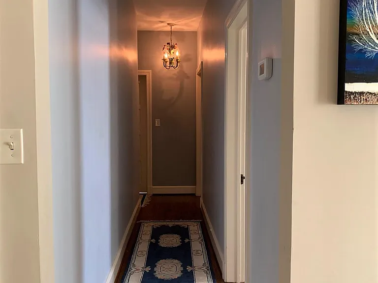 upstairs hallway, leads to 3 bedrooms/office and full bath