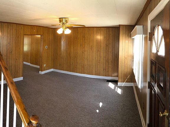 Living room with Front door entrance
