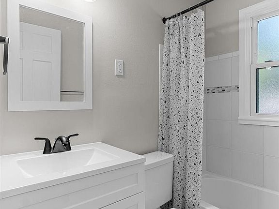 5th image of 7849 Utica Dr